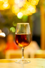 Christmas sherry wine, dry or sweet jerez fortified wine in glasses and street lights, Jerez de la Frontera, Andalusia, Spain