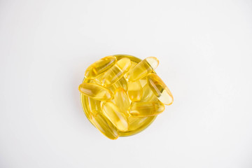 Cod liver oil omega 3 gel capsules isolated on white background