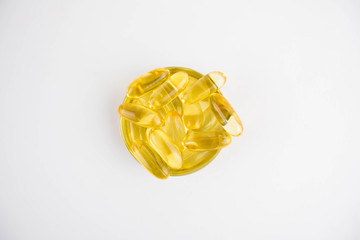 Cod liver oil omega 3 gel capsules isolated on white background