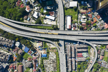 View from above, stunning aerial view of Kuala Lumpur city with a busy road intersection. Kuala...