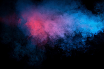 Fototapeta na wymiar Abstract texture of backlit smoke in red blue on a black background.