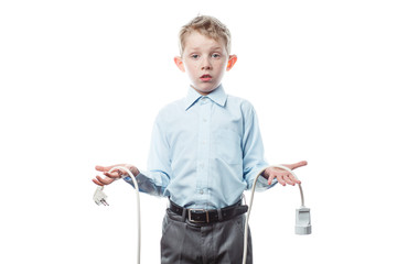 boy with an electric plug in his hands isolated on a white background