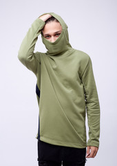 photo of man wearing in olive hoodie isolated on white background.