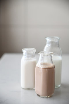 Close up of milk in glass bottles