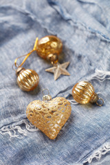 Christmas golden baubles on blue background. Copy space. 