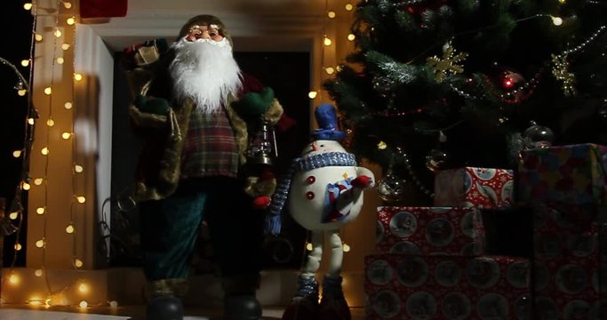 Santa clause standing in specially decorated room, looking at camera and smiling - christmas spirit concept close up portrait 4k footage