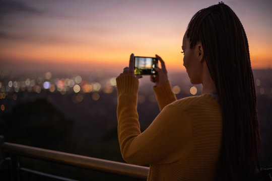 Woman viewing panorama of a modern city