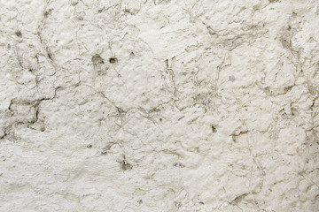 Background in the form of a plastered wall