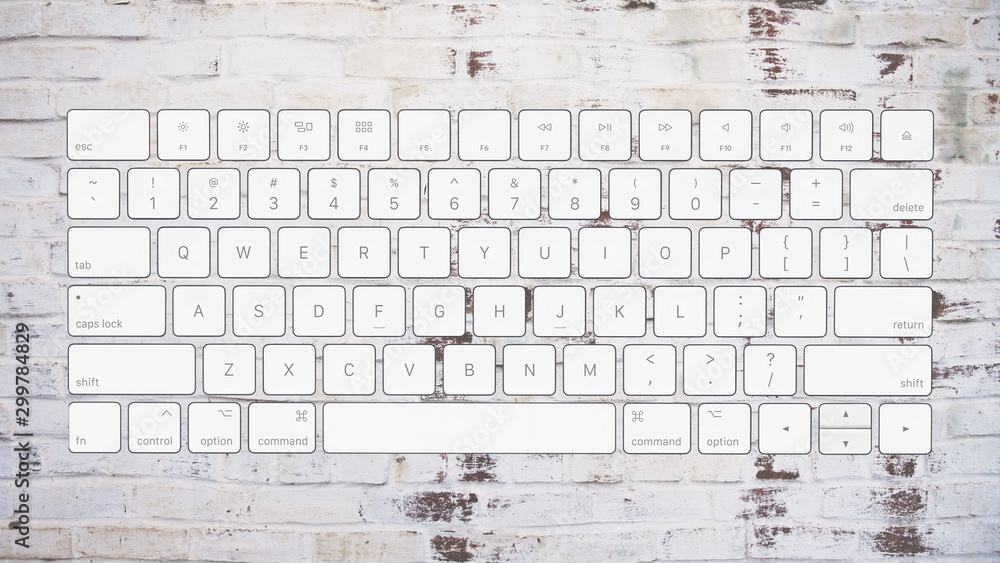 Wall mural english computer keyboard layout on brick background