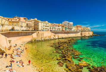 View of the city beach of Ortygia, the historical part of Syracuse, Sicily, Italy