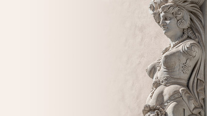 Banner of Ancient wall sculpture of a sensual woman warrior Amazonian in chain armor as defender in downtown of Dresden, Germany, details, closeup, paste space