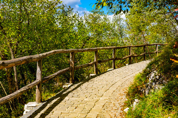 Pathway and green nature in National Park Plitvice Lakes in autumn, Croatia