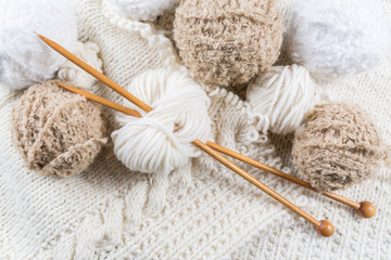 Fototapeta na wymiar Wool for knitting with knitting needles