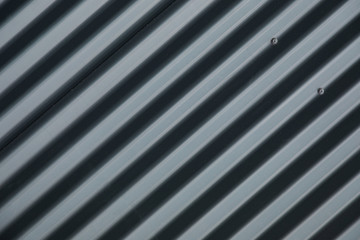 Obraz premium Diagonal close-up of striped ribbed metal surface