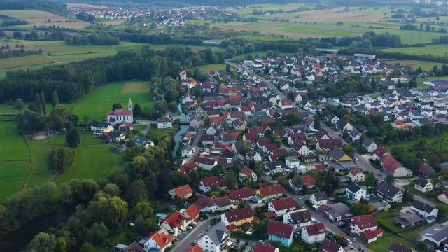 Aerial view of the city  Beuren an der Aach in Germany. On a sunny day in summer. Zoom in on the village.