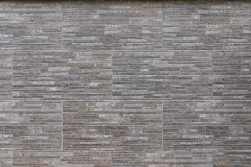 Close-up of white decorative faux stone wall