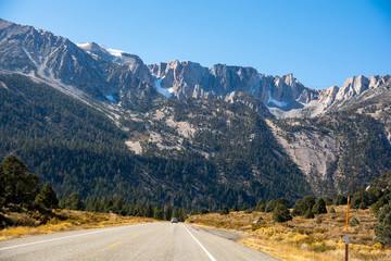 Drive to the Yosemite park. Nice road between peaks.