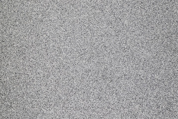 Texture of a black-and-white granular stone surface