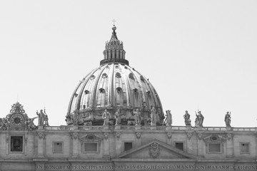 Fototapeta na wymiar Black and white photo of Saint Peter's Basilica in St. Peter's Square, Vatican City. Vatican Museum, Rome, Italy.