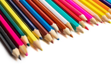 Fototapeta premium many color pencils isolated on white background. design layout. Blank space for text