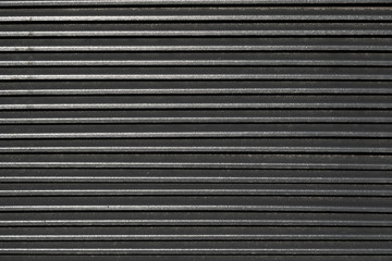 Obraz premium Flatlay of ribbed metal surface for the blind