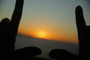 Hands Frame Silhouette on Sunset