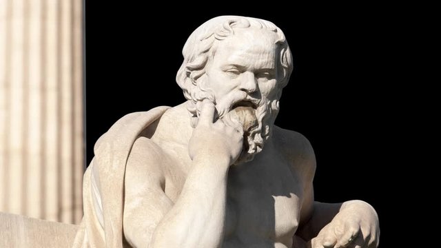 classic statue of Greek philosopher Socrates sitting