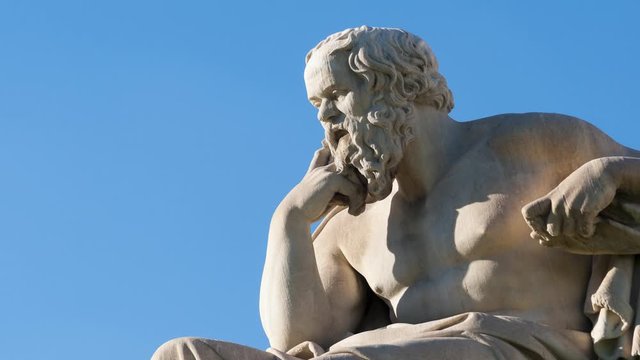 classic statue of Greek philosopher Socrates sitting