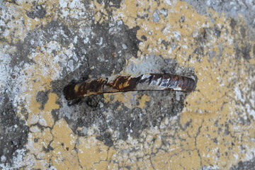 rusty iron ring on concrete floor