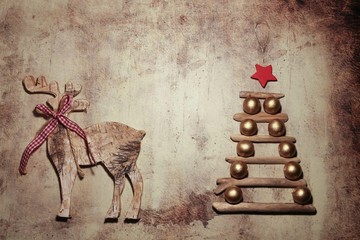 Christmas tree made of wooden branches and elk