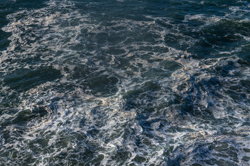 Fototapeta na wymiar Atlantic ocean waves at Nazare, Portugal.