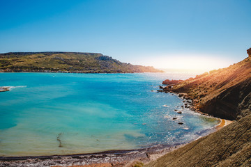 Fototapeta na wymiar Golden Bay Malta summer tourist resort beach azure water sea, . Concept travel