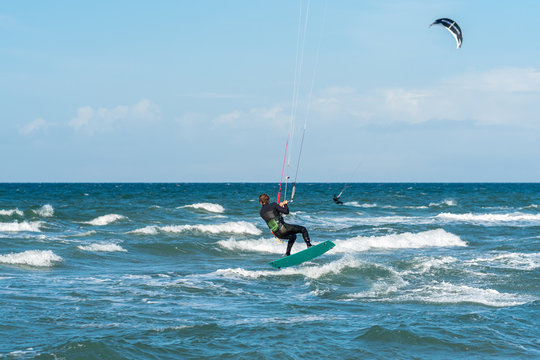 Kiteboarder in the Baltic Sea at the beach of Fl&uuml;gge on the island of Fehmarn in the north of Germany