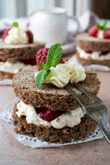 chocolate cake with cream and strawberries