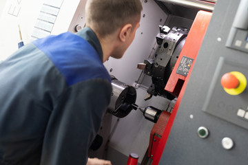 the operator of the machine performs debugging and tuning of the machine with program control