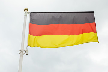 flag of Germany in the white sky
