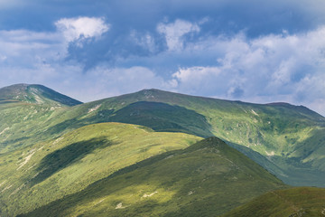 Mountain Range with Silhouettes through the Fog