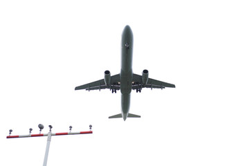 Passenger plane with landing gear and white background - Stockphoto