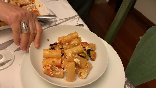 Serving pasta plate meal dinner closeup