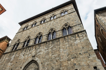 Fototapeta na wymiar Ancient building in the center of Siena