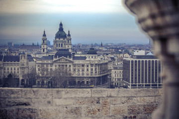 Bridges in Budapest over the Danube River and a building on the waterfront.