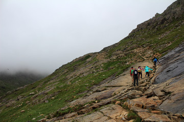 hiker on top of mountain