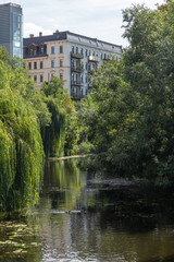 View of historic and modern buildings and churches on the Karl Heine canal in Leipzig / Germany...