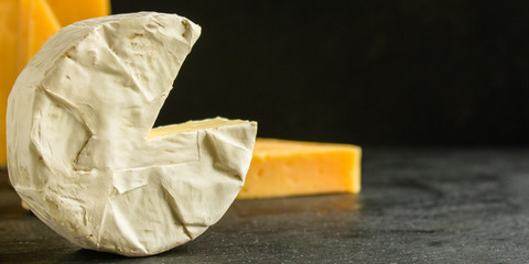 cheese variety (delicious snack, different types of hard and soft cheese) menu concept. food background. copy space. Top view