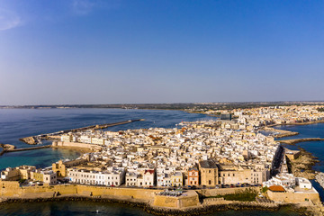 Obraz premium Aerial view, old town with fort, ramparts and harbor, Gallipoli, Lecce province, Salento peninsula, Puglia, Italy