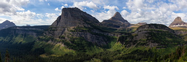 Obraz premium Glacier National Park, Montana, United States. Beautiful Panoramic View of American Rocky Mountain Landscape during a Cloudy Summer Morning.