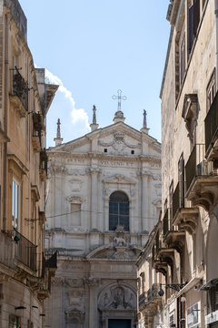 LECCE, Puglia ,Italy - May 2, 2019: Facade of Ancient Baroque church Santa Irene in historical center in the old town. A region of Apulia. Ancient Baroque church, sant Irene facade, Lecce , Italy