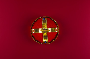 red golden king crown isolated on red background