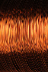 Close-up large coil of thin copper wire