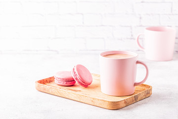 French macaroons and cup of coffee.